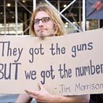 hippie protesting with a morrison quote!