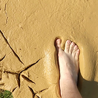 Mud between my toes