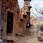 house made of hand and sand